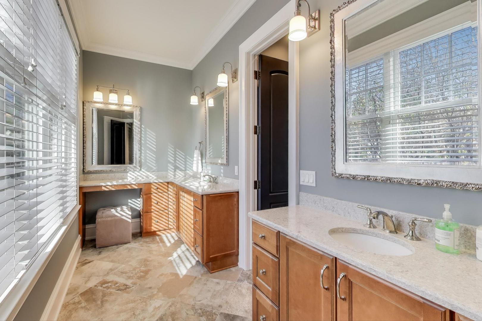 347 Bluffs Edge Drive Lake Forest, IL 60045 - Photo 29 of 79 a bathroom with a granite countertop sink and a mirror