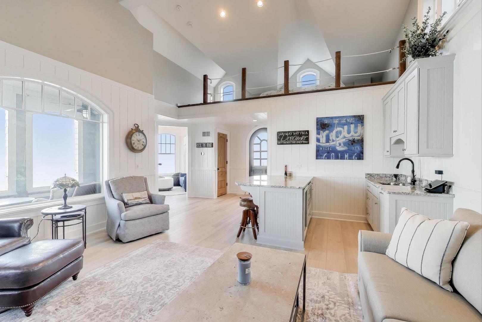 347 Bluffs Edge Drive Lake Forest, IL 60045 - Photo 66 of 79 a living room with furniture and a large window