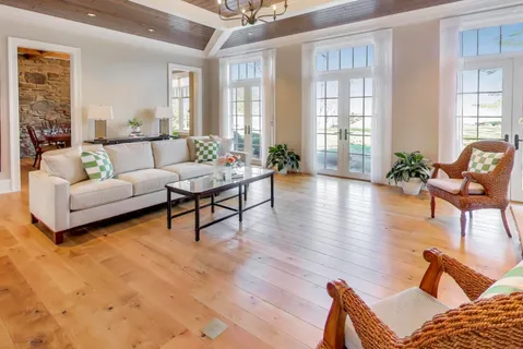 a bath room with a table and chairs