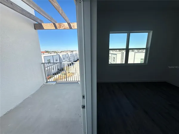 a view of an empty room and window