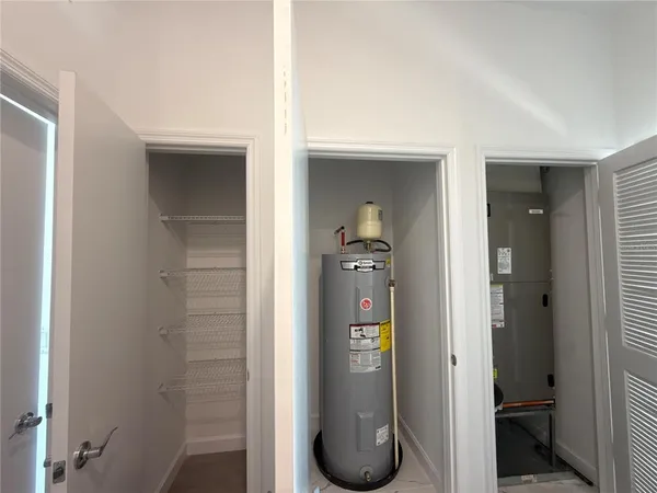 a bathroom with a shower and toilet