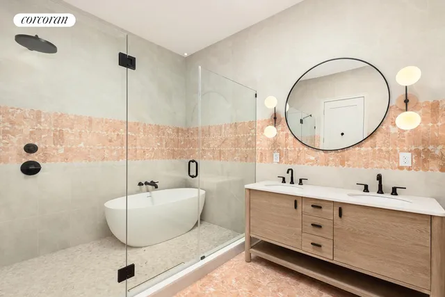 a bedroom with a bed lamp and a window