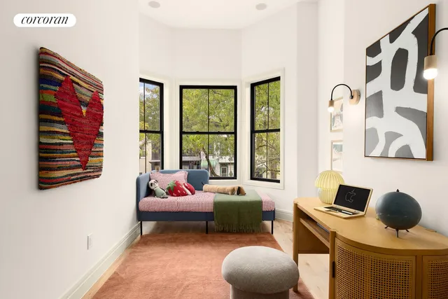a bathroom with a sink mirror and bathtub