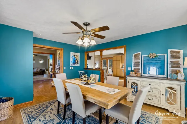a view of a livingroom with furniture and windows