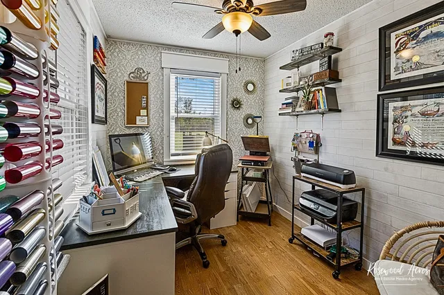 a view of a patio with couches table and chairs and potted plants
