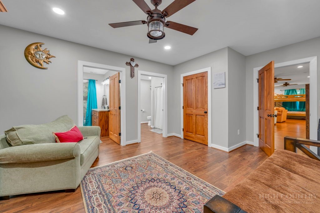160 Outback Road Ferguson, NC 28624 - Photo 48 of 49 a living room with furniture and a rug