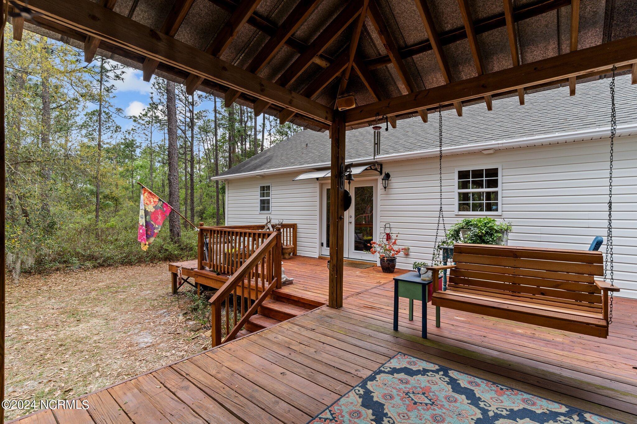 1310 Maple Road Southport, NC 28461 - Photo 32 of 50 Backdeck2Maple