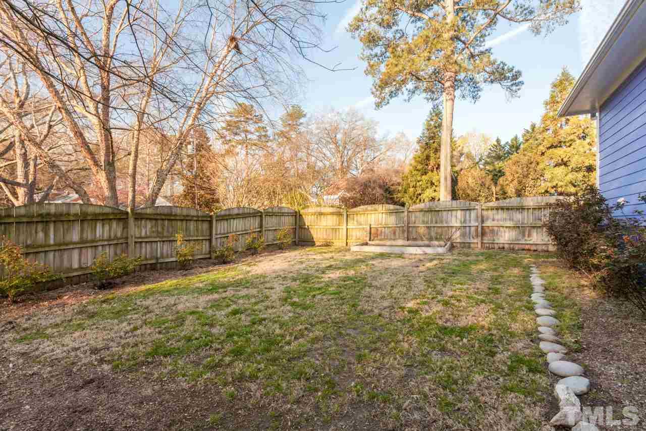 500 Frank Street Raleigh, NC 27604 - Photo 10 of 23 a view of a yard with large trees
