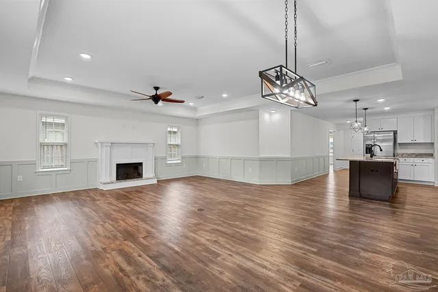 a bathroom with a granite countertop sink mirror and a