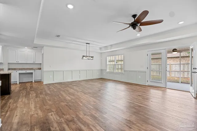 a bathroom with a shower and a glass door