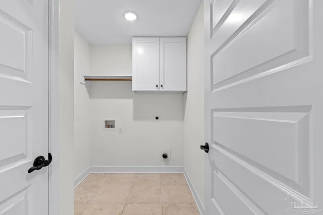 a kitchen with kitchen island granite countertop stainless steel appliances a sink stove top oven and cabinets