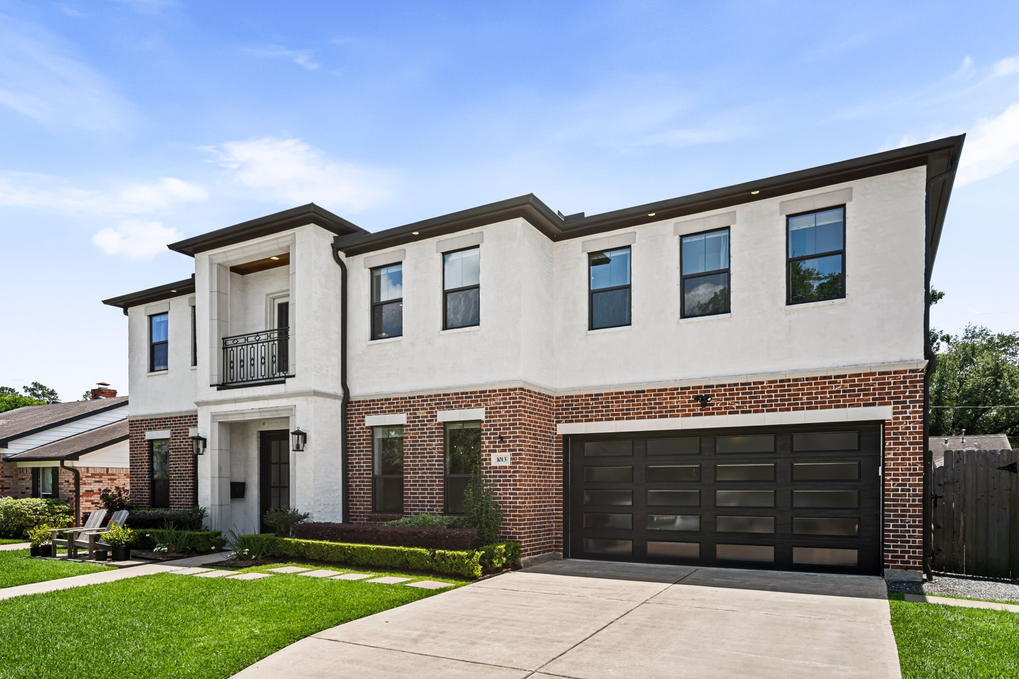 1013 Martin Street Houston, TX 77018 - Photo 2 of 46 Thoughtfully built residence, completed in 2019, w/impeccable craftsmanship, custom Hunter Douglas window treatments, extensive built-ins, hardwood flooring, crown molding throughout, & a Kohler whole home generator.