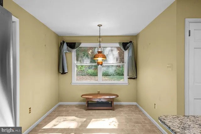 a room with window and stairs