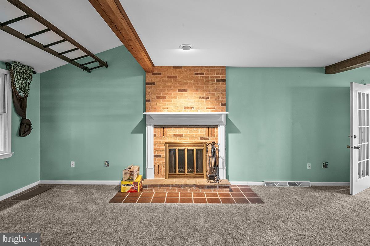 310 4th Street Reading, PA 19607 - Photo 21 of 44 a room with furniture and a fireplace