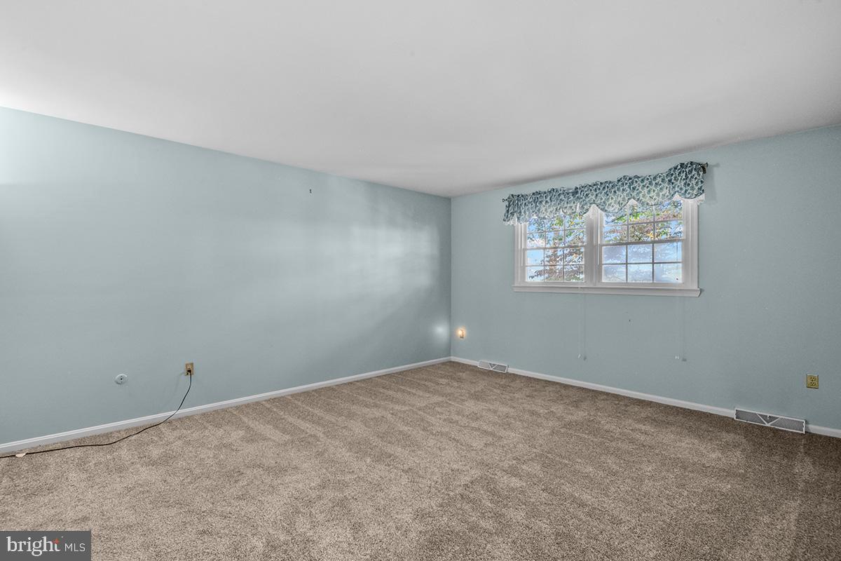 310 4th Street Reading, PA 19607 - Photo 35 of 44 a view of an empty room with a window