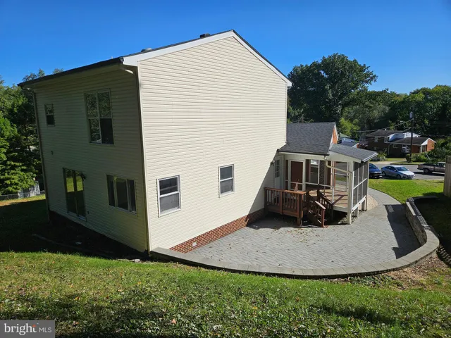a top view of a house with a yard