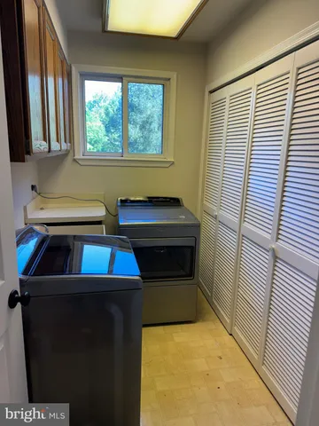 a kitchen with a sink and a window