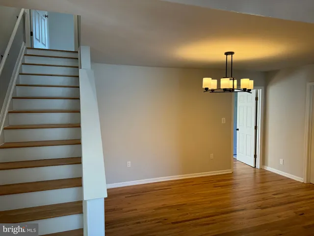 a view of entryway with wooden floor