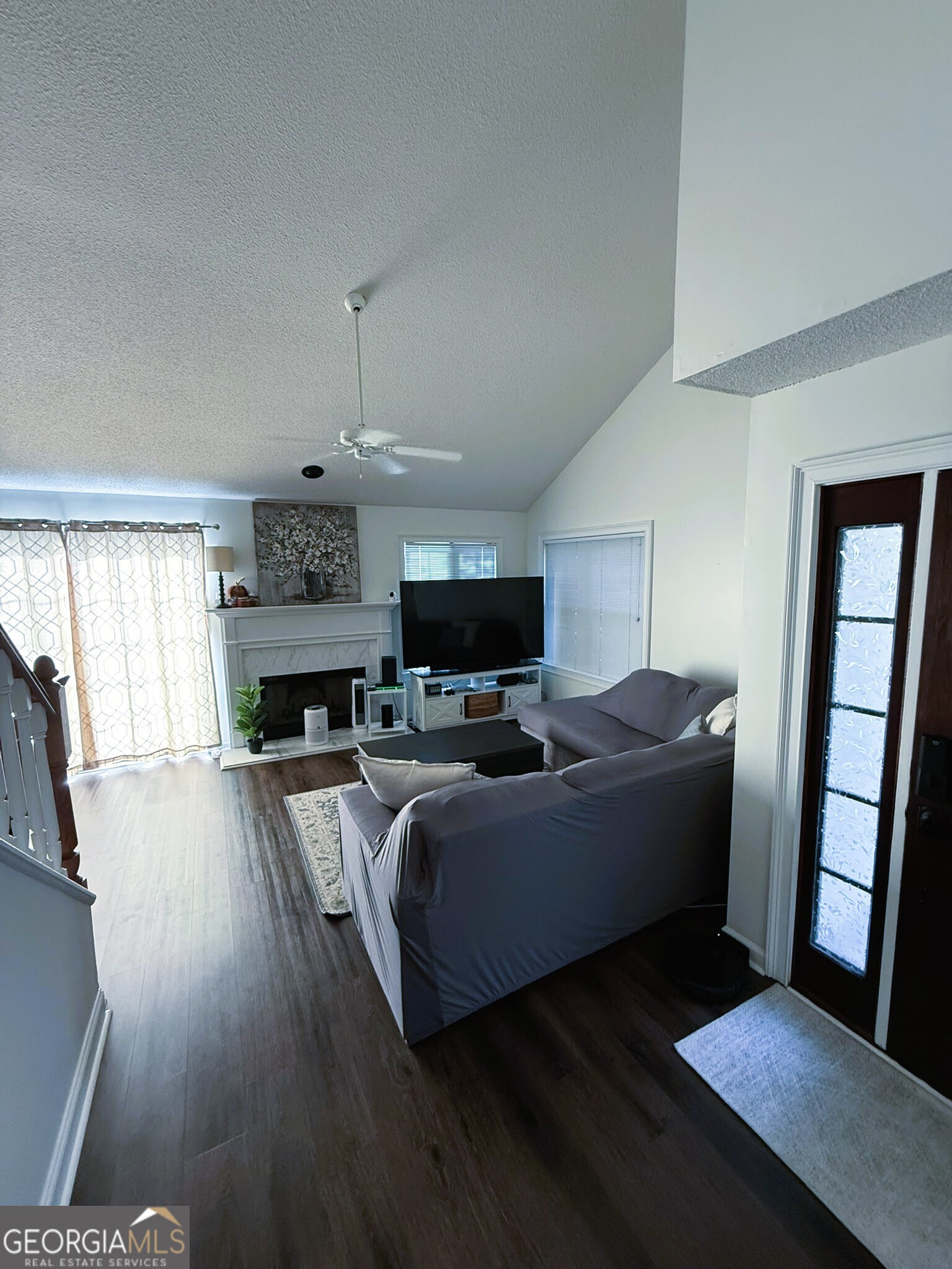 1910 North Loop Road, Unit 6B Vidalia, GA 30474 - Photo 13 of 39 a living room with furniture and a fireplace
