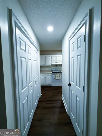 a view of a bathroom from the hallway
