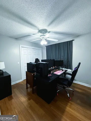 a bathroom with a double vanity sink toilet and shower