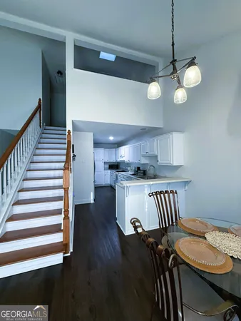a view of kitchen and sink
