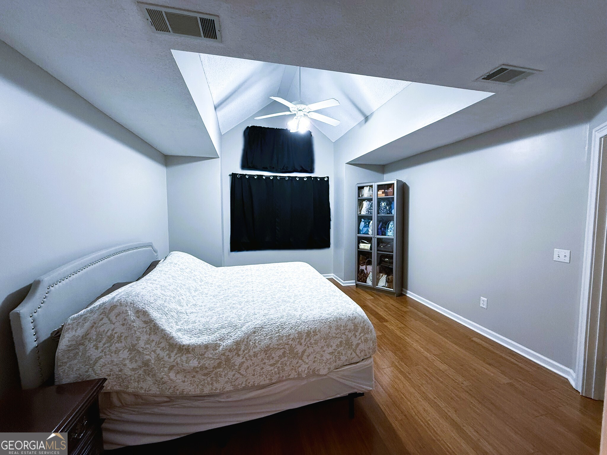 1910 North Loop Road, Unit 6B Vidalia, GA 30474 - Photo 35 of 39 a bedroom with a bed and a television