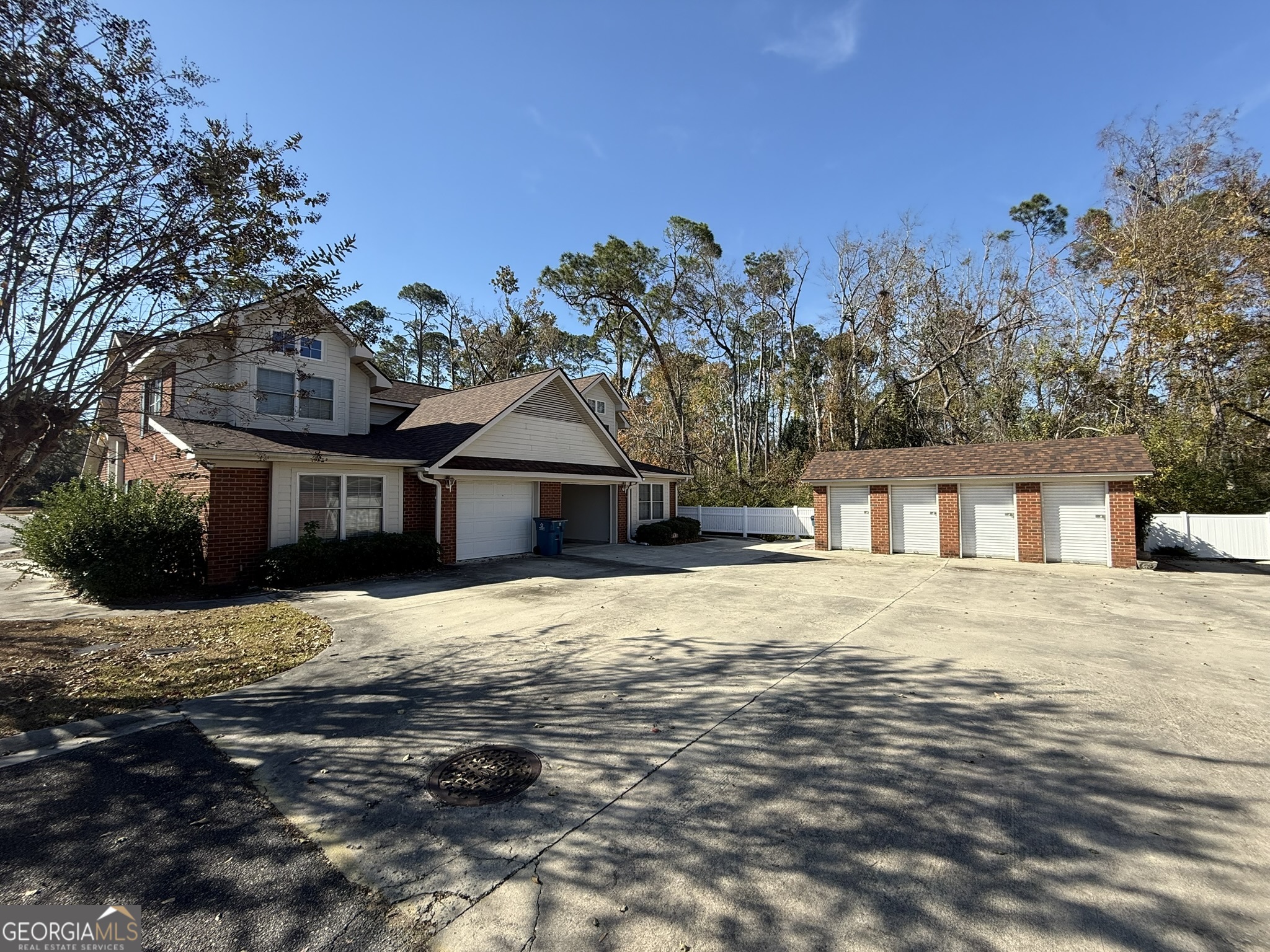 1910 North Loop Road, Unit 6B Vidalia, GA 30474 - Photo 6 of 39 a front view of a house with a yard covered in snow