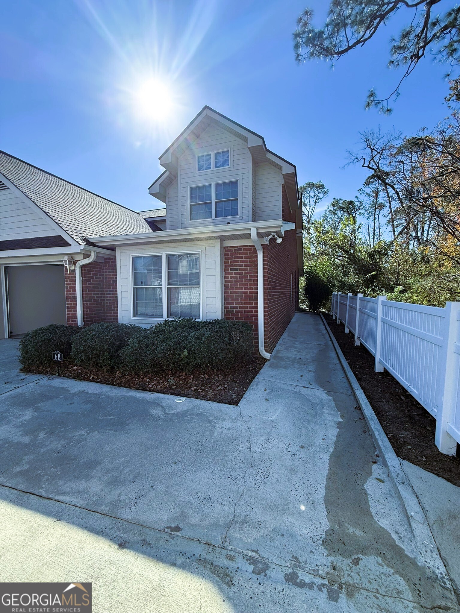 1910 North Loop Road, Unit 6B Vidalia, GA 30474 - Photo 9 of 39 a view of a house with a yard