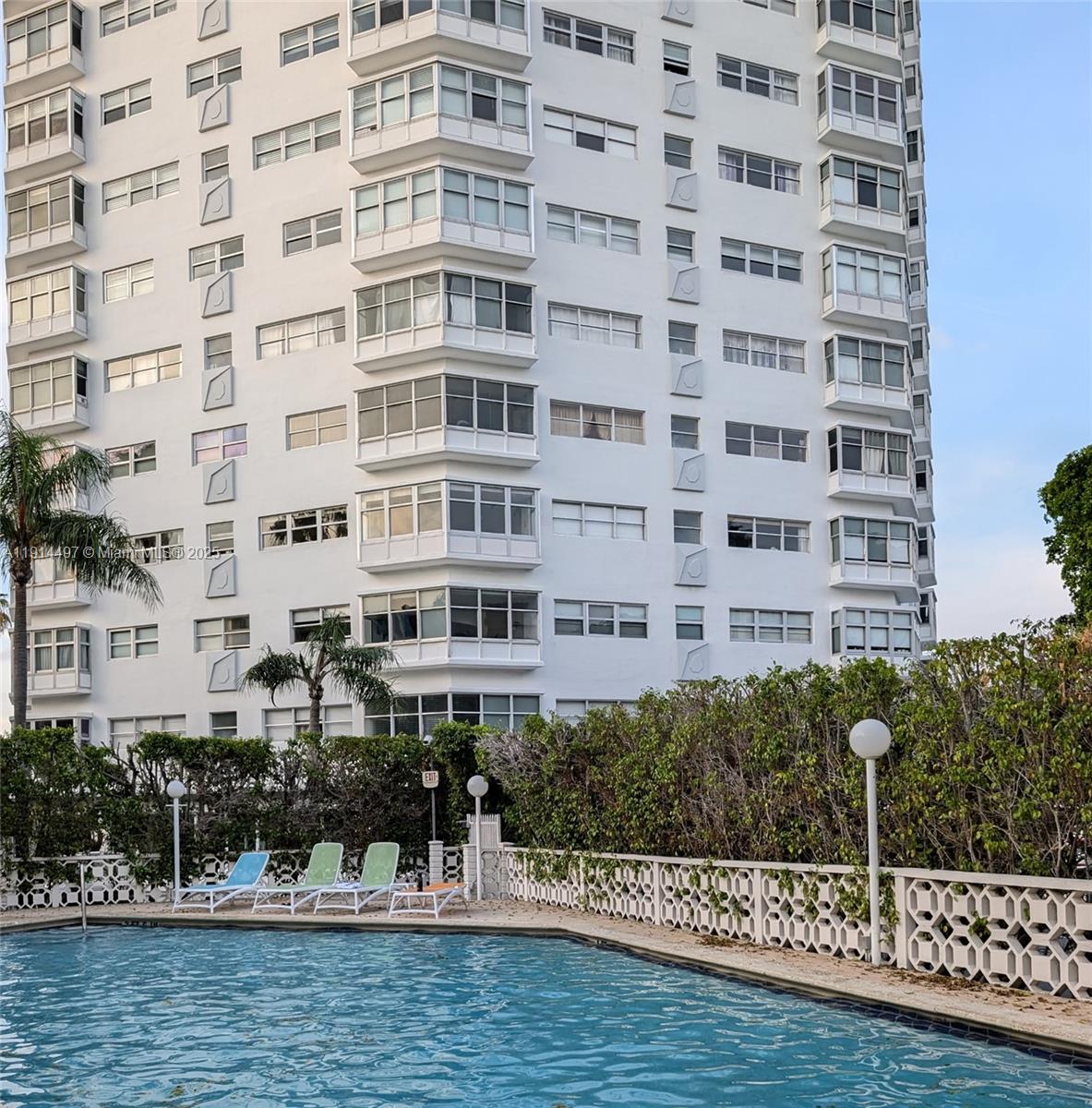1881 Washington Avenue, Unit 4A Miami Beach, FL 33139 - Photo 12 of 15 a front view of a building with swimming pool