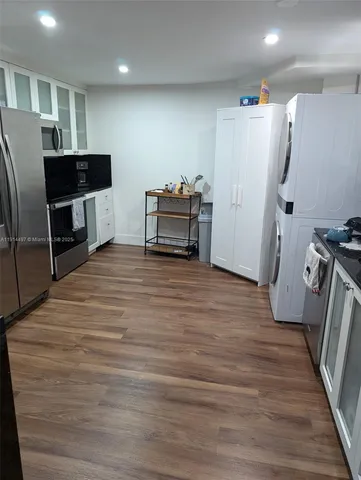 a room with furniture and a flat screen tv