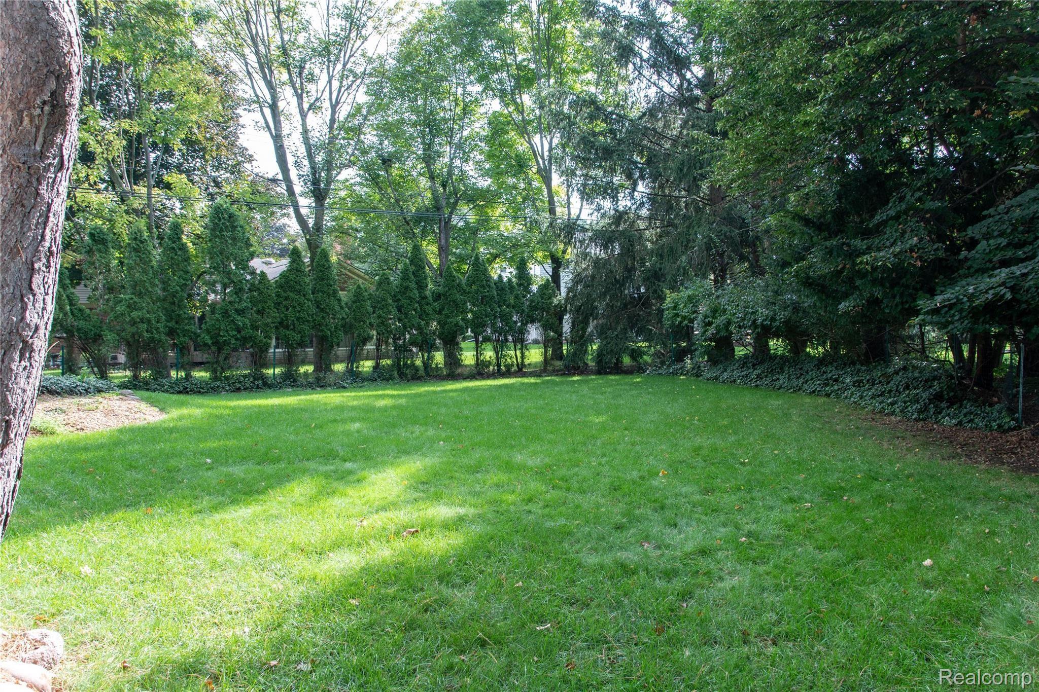 2275 Chalet Drive Rochester, MI 48309 - Photo 60 of 62 Beautiful backyard lined with Arborvitaes