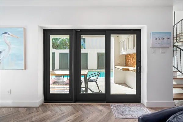 a view of a livingroom with furniture and front door
