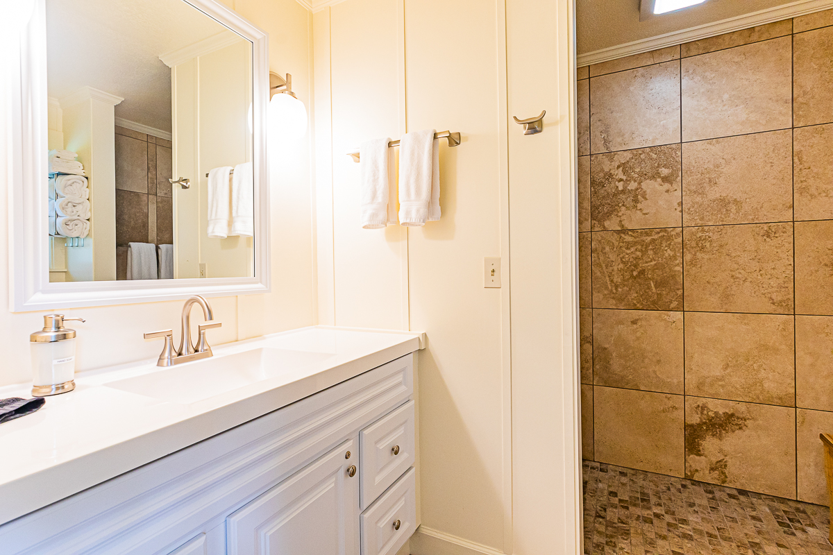 19-4029 Kilauea Road Volcano, HI 96785 - Photo 27 of 30 a bathroom with a sink and a mirror