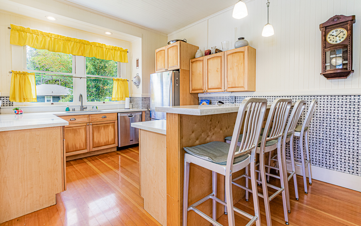 19-4029 Kilauea Road Volcano, HI 96785 - Photo 6 of 30 a kitchen with a sink a window and chairs