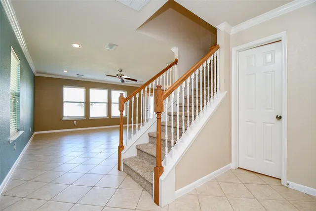 a view of entryway and hall with a window