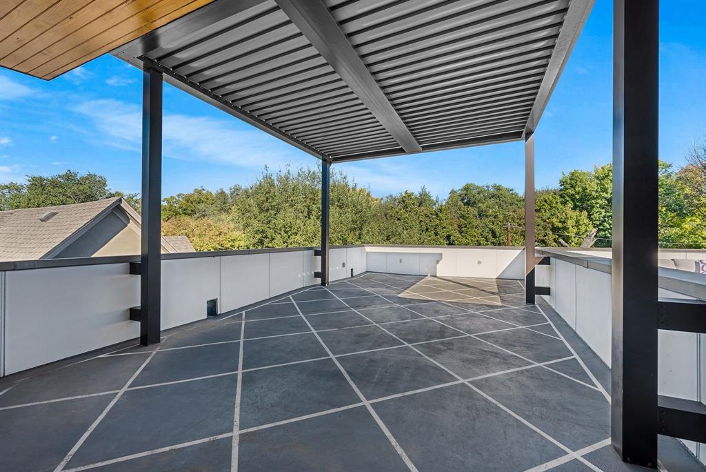 4214 Hawthorne Avenue Dallas, TX 75219 - Photo 27 of 39 a view of a patio with a yard