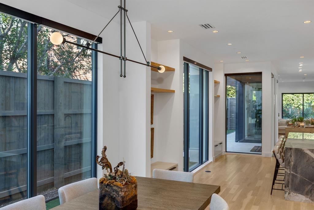 4214 Hawthorne Avenue Dallas, TX 75219 - Photo 9 of 39 a living room with a large window and furniture