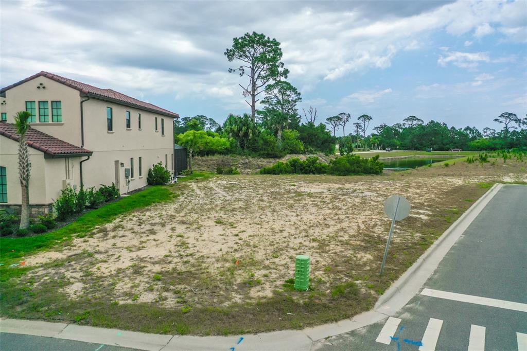 a view of a fountain in front of a house