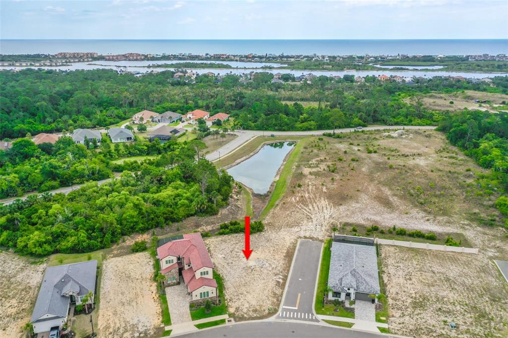 14 Rio Vista Drive Palm Coast, FL 32137 - Photo 12 of 32 an aerial view of a house with a yard