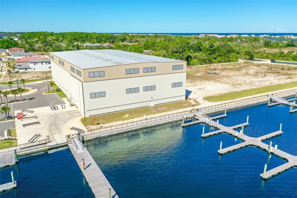 14 Rio Vista Drive Palm Coast, FL 32137 - Photo 22 of 32 swimming pool view with a outdoor seating space