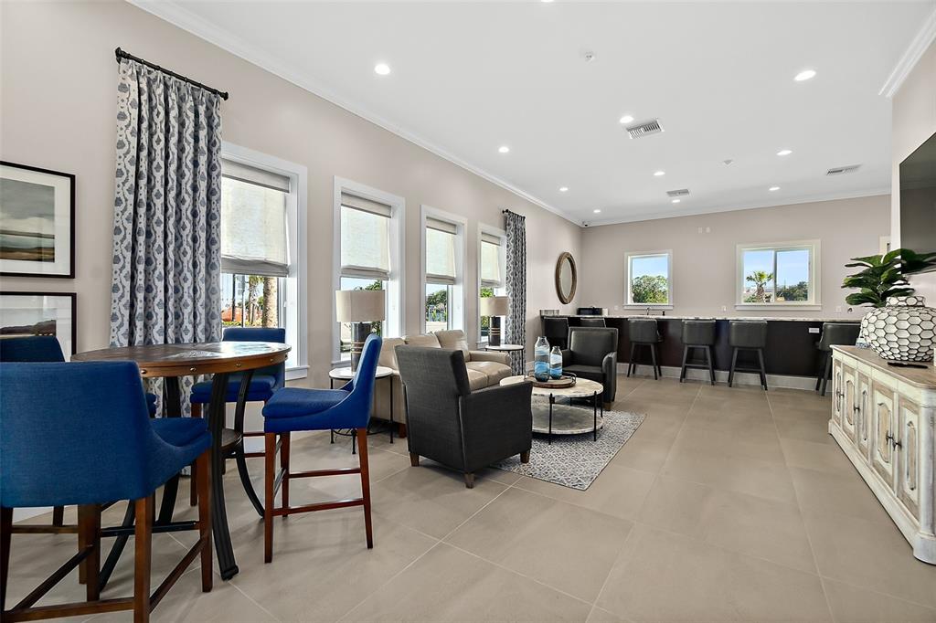14 Rio Vista Drive Palm Coast, FL 32137 - Photo 29 of 32 a living room with furniture and a large window