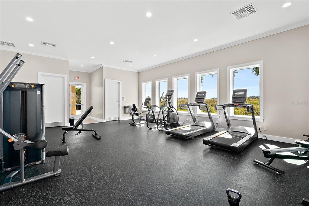 14 Rio Vista Drive Palm Coast, FL 32137 - Photo 32 of 32 a view of a room with gym equipment
