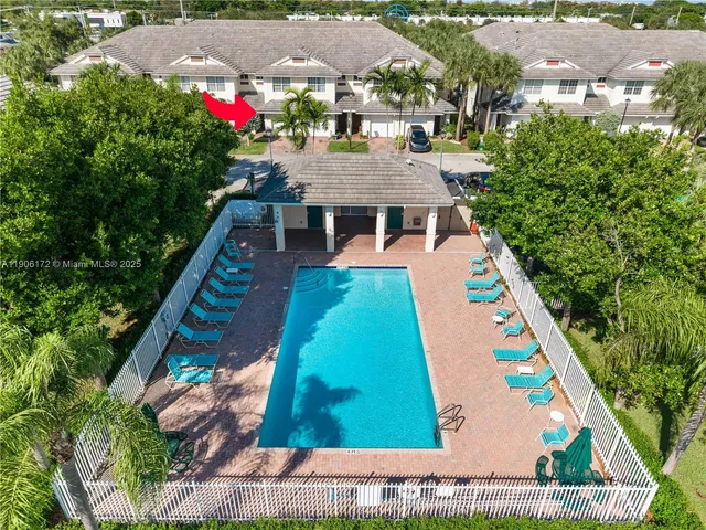 an aerial view of city and lake