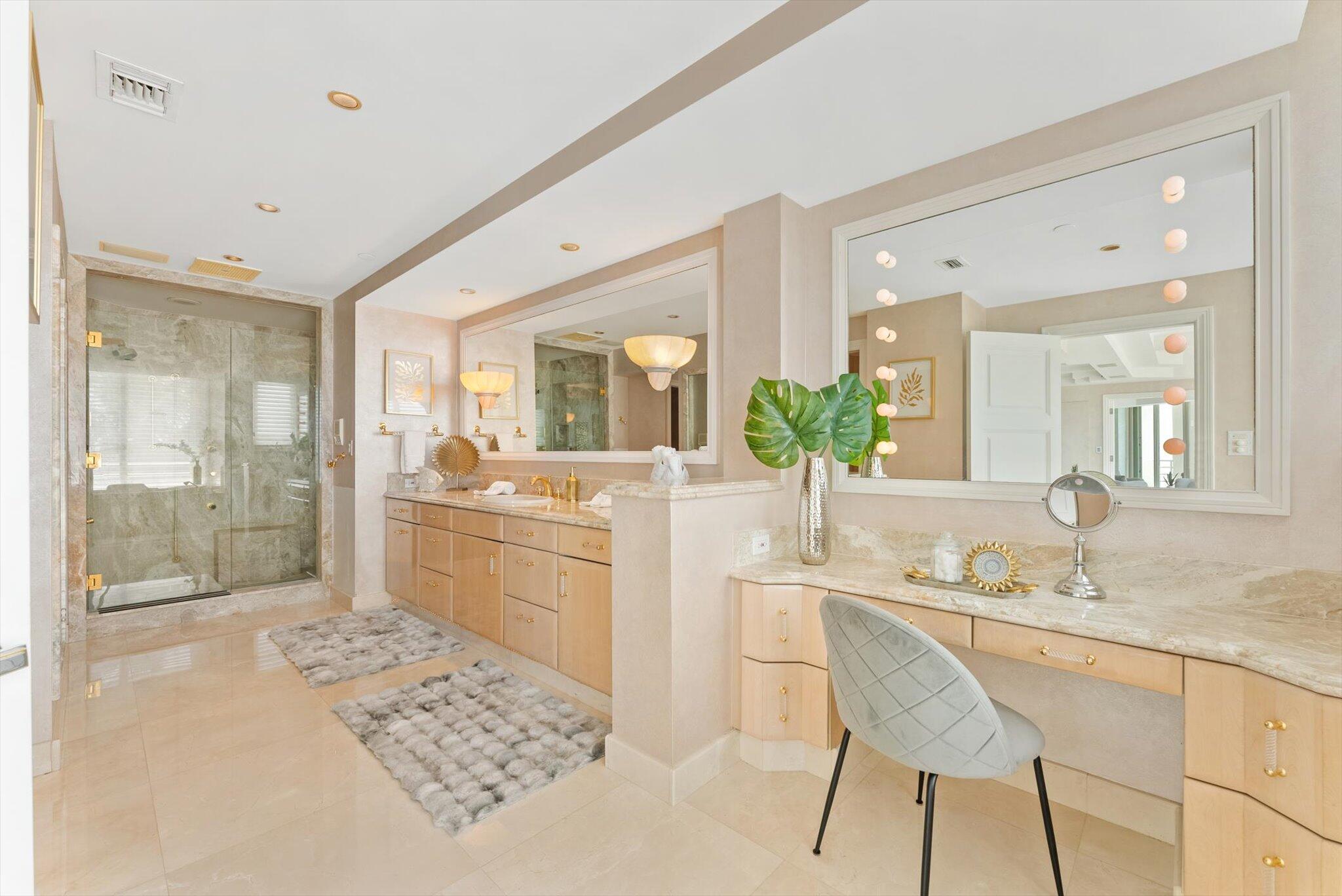 800 South Ocean Boulevard, Unit 303 Boca Raton, FL 33432 - Photo 23 of 49 a bathroom with a sink and a mirror