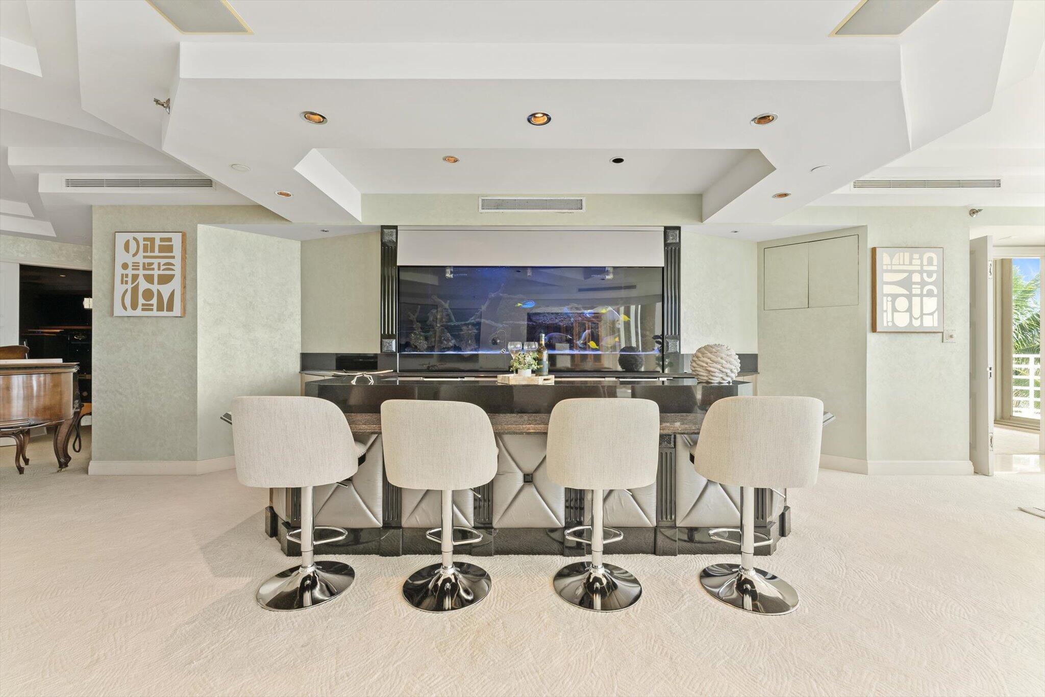 800 South Ocean Boulevard, Unit 303 Boca Raton, FL 33432 - Photo 8 of 49 a view of a dining room with furniture