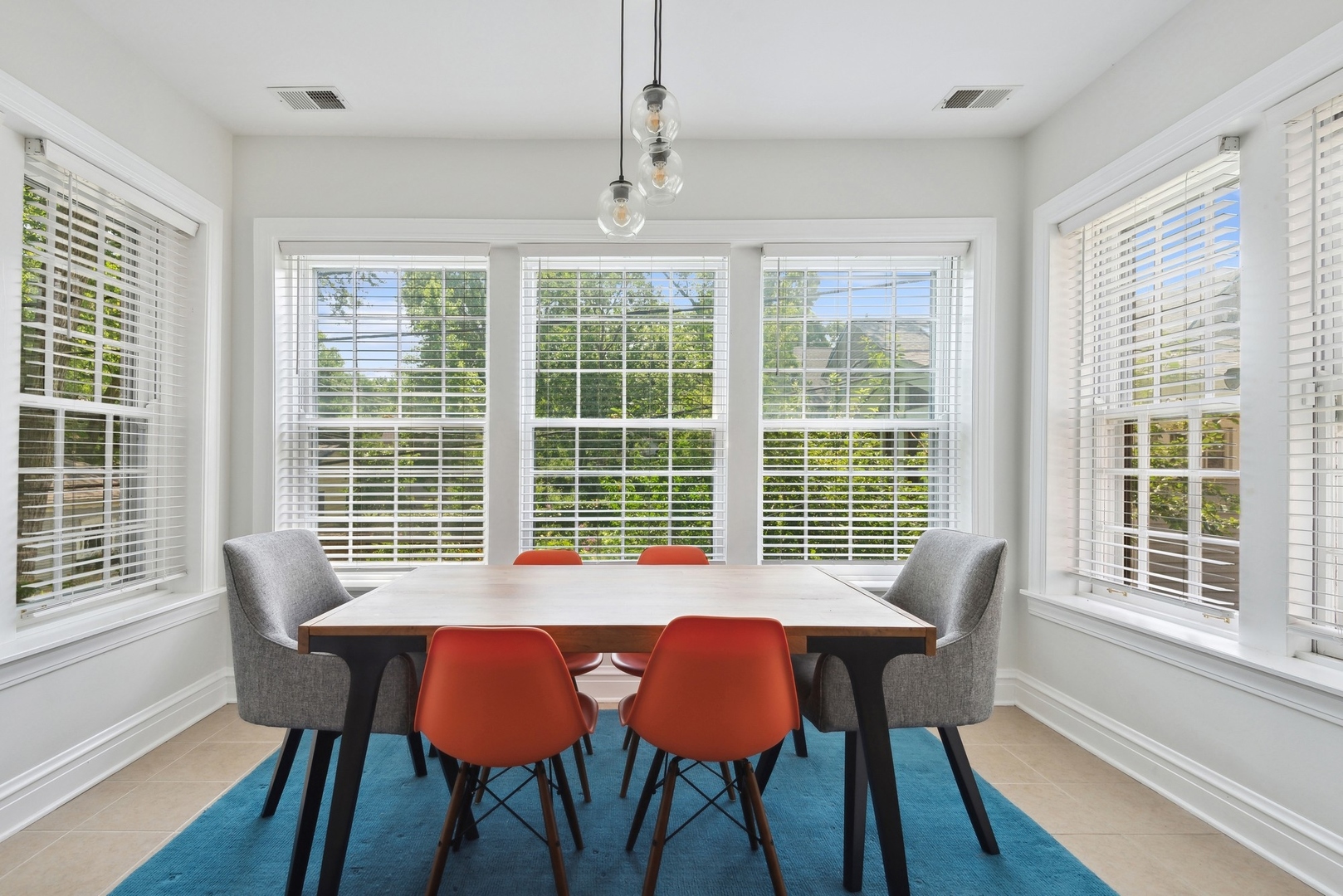 422 Hamilton Street, Unit 1 Evanston, IL 60202 - Photo 13 of 23 a view of a dining room with furniture window and outside view