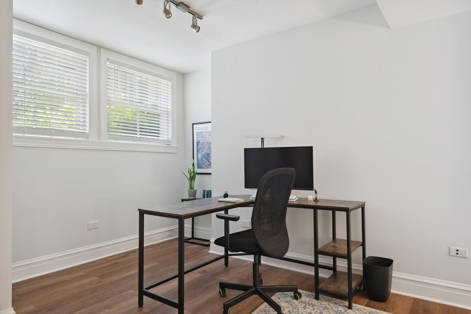 422 Hamilton Street, Unit 1 Evanston, IL 60202 - Photo 19 of 23 a view of a workspace with furniture
