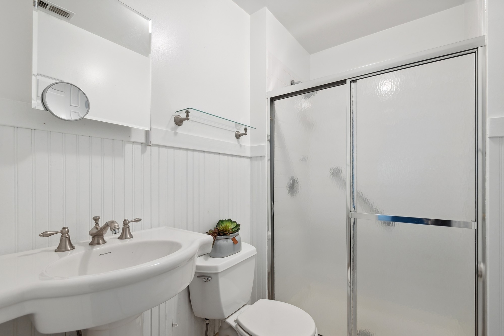 422 Hamilton Street, Unit 1 Evanston, IL 60202 - Photo 21 of 23 a bathroom with a sink toilet and shower