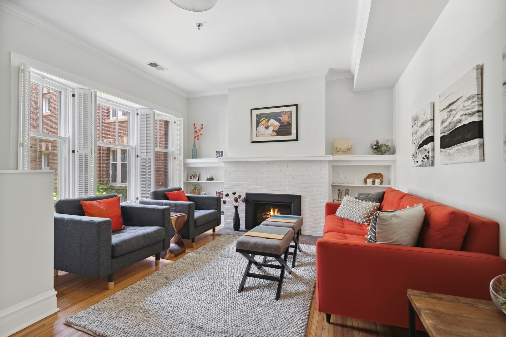 422 Hamilton Street, Unit 1 Evanston, IL 60202 - Photo 5 of 23 a living room with furniture and a fireplace